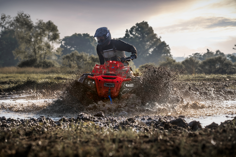 Polaris Sportsman XP 1000 Mud Edition riding through mud near Slidell